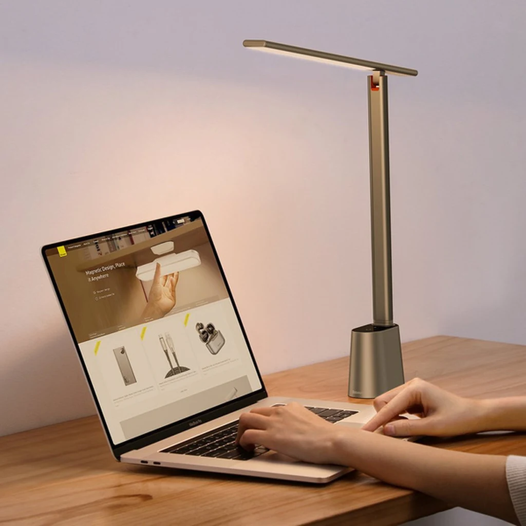 Baseus Smart Eye grey lamp lighting a desk with a laptop during remote work
