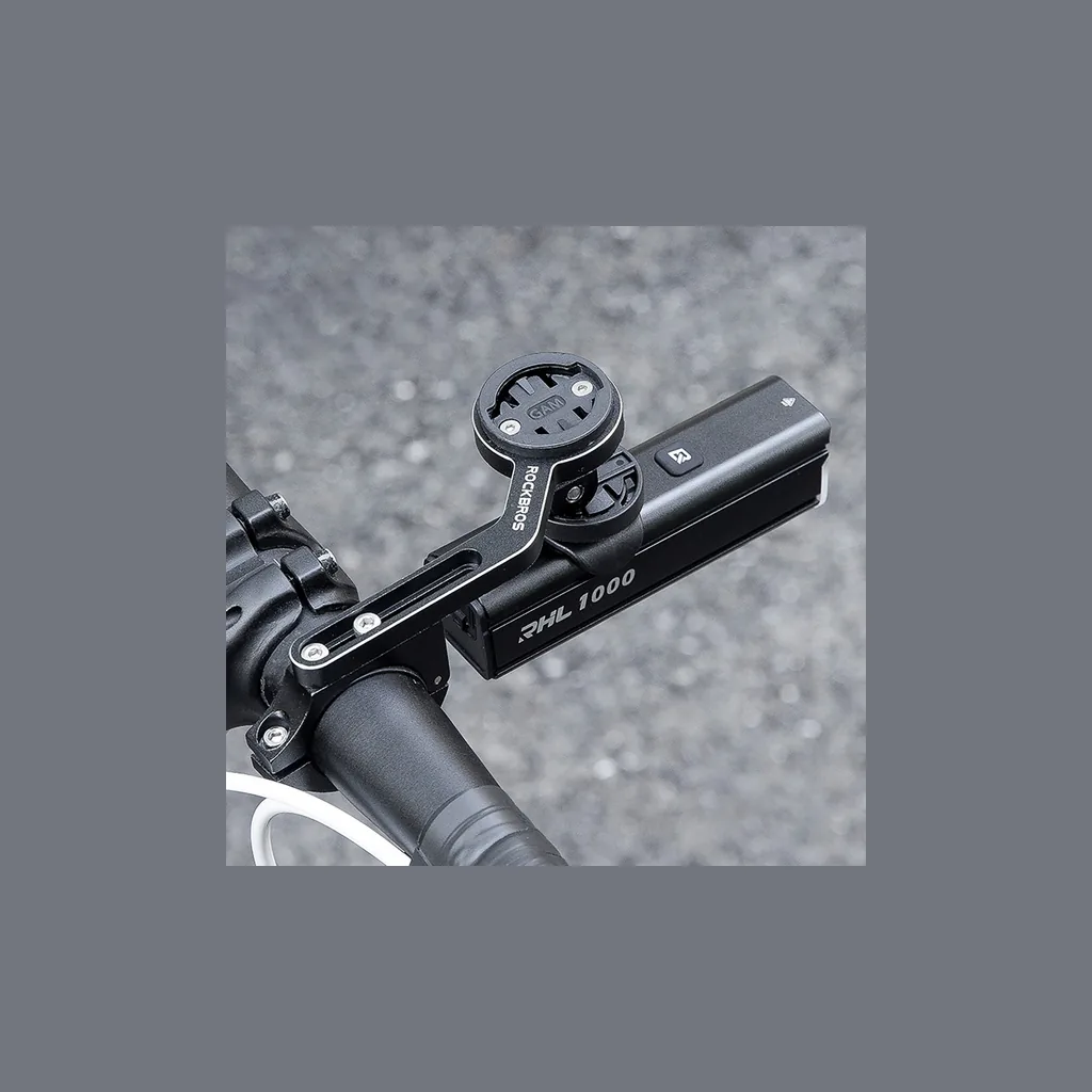 Luz ROCKBROS RHL1000 instalada en un soporte adelantado de manillar en bicicleta de carretera